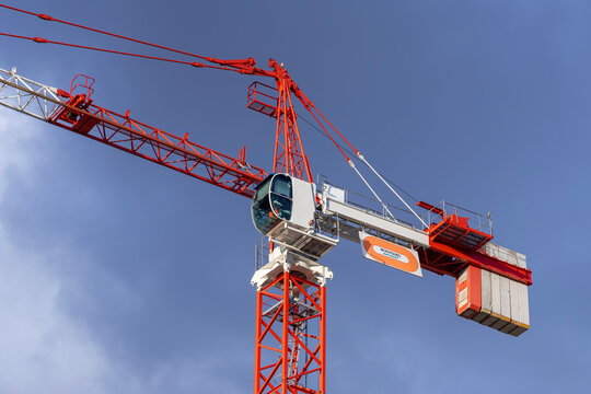 Nancy, France - January 9th 2019 : View on a tower crane Potain MD 265 B1 J12 on a construction site for the construction of a building.