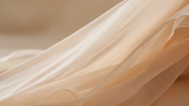 Soft beige fabric texture with delicate flowing translucent layers in gentle light