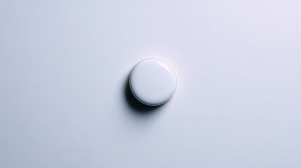 A close-up image of a white, circular object on a light background, ideal for minimalist design projects, product showcasing, or abstract art purposes, Perfect for modern and clean aesthetics,