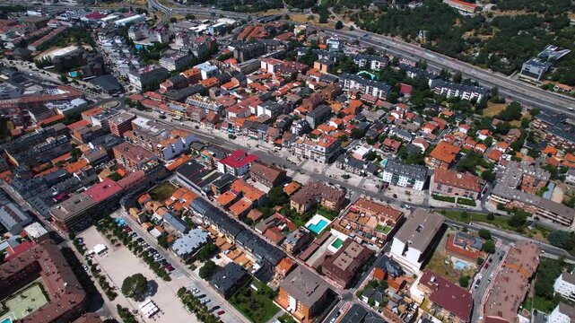 Aerial panorama view of the old town and city Collado Villalba in Spain on a sunny summer noon.