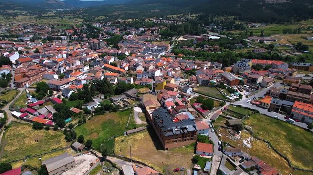 Aerial panorama view of the old town and city El Espinar in Spain on a sunny summer noon.