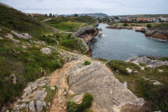 Coastal Trail on Cliffs with Bay and Seaside Village