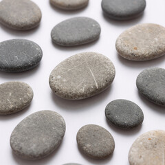 glitch art sea harmony. collection of smooth sea pebbles in natural grays and beiges against white background for zen design