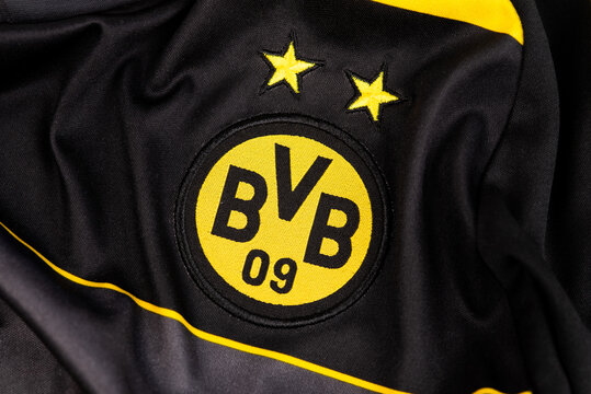 Kyiv, Ukraine - february, 2026. Close-up of the Borussia Dortmund (BVB) logo with two stars embroidered on a black and yellow soccer jersey.