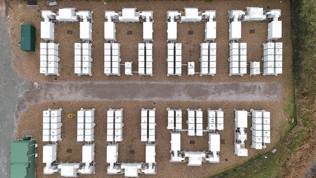 Aerial overview of a major UK battery storage hub in Burwell, illustrating the critical infrastructure used to stabilize electricity networks.