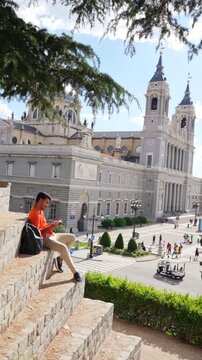 Man enjoying reading outdoors in Madrid Spain