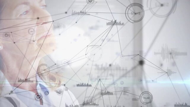 Senior medical doctor lowering hand, lifting chin, looking out window while overlay shifting charts