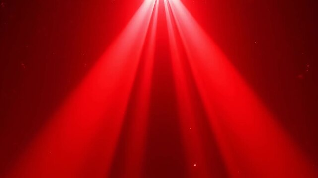 Red light beams converging in dark space