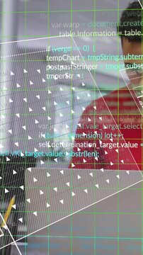 Vertical video: Man using laptop, starting AR overlays with currency UI and code analyzing finance