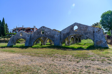 Venetian shipyard remains with stone arches, Corfu, Greece