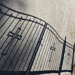 Shadow of graveyard gates