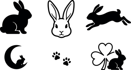 Fototapeta premium Black silhouette sitting running and face front bunny rabbit with paw prints and clover leaf vector art collection