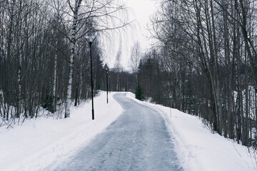 An icy walkway and cycle path along the Hunnselva River in the town of Gj&oslash;vik, Norway.