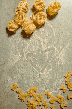 Rustic Italian pasta with a flour-drawn heart shape
