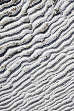 Abstract travertine texture with wavy pattern detail