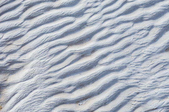 Wavy travertine texture with natural gray patterns