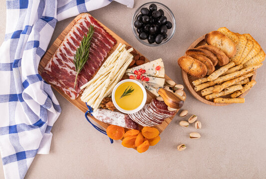 Assorted cheese and charcuterie platter with snacks