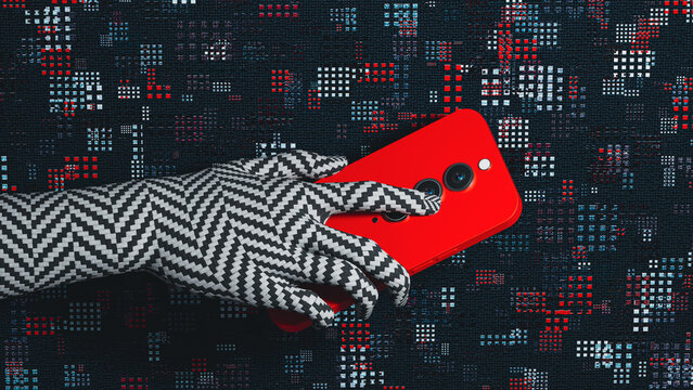 Hand holds a mobile phone matching wall texture in room setting