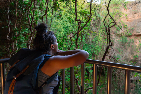 Hiker admiring The Sinkhole of Los Aines