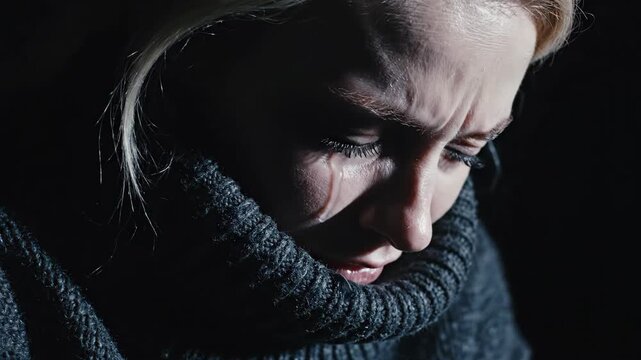 Woman showing grief with tears welling up. Emotional close-up portrait of sorrow and distress progression. Human sadness concept in sequential expressions.