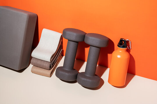 Fitness essentials with dumbbells and yoga block