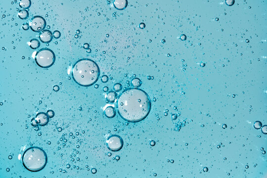 Bubbles and textures in a petri dish background