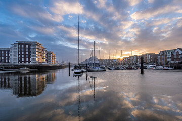 City Marina in Cuxhaven, Germany at sunset with a partially ice-covered water surface