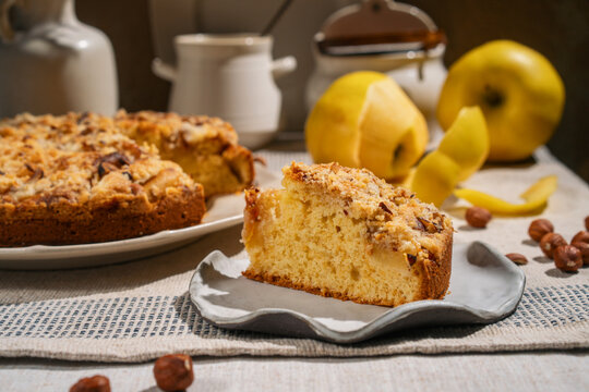 Apple crumble cake topped with hazelnuts