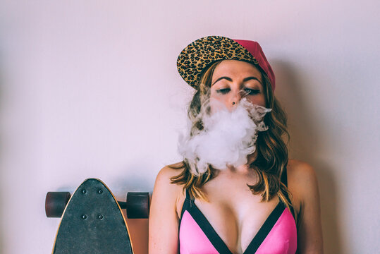 Skater woman enjoying a cannabis break