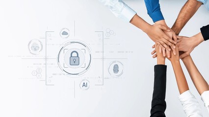 Diverse hands come together above digital elements, symbolizing trust and cooperation in...