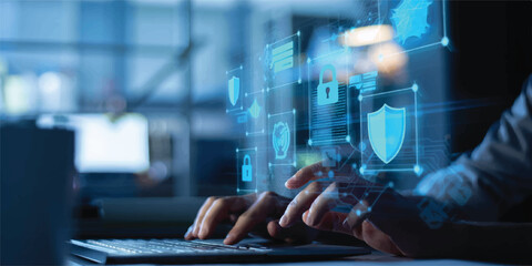 Abstract digital screen interface showing cybersecurity icons, shields, and locks with user hands typing, data protection, network security, user experience © RoyhanaFatema