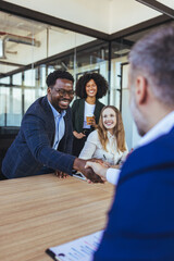 Fototapeta premium Business Team Handshake During Successful Office Meeting Showing Partnership, Collaboration and Professional Confidence