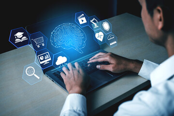 Person Using Laptop with Floating Digital Icons Representing Artificial Intelligence, Technology,...