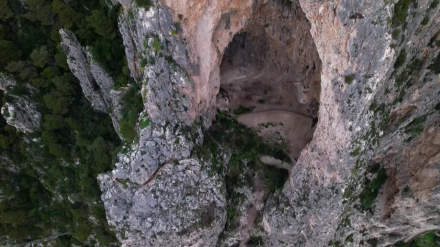 Aerial view of the Grotta delle Felci cave on the island of Capri, Italy. Video of the Grotta delle Felci, a large prehistoric cave located on the southern coast of Capri.