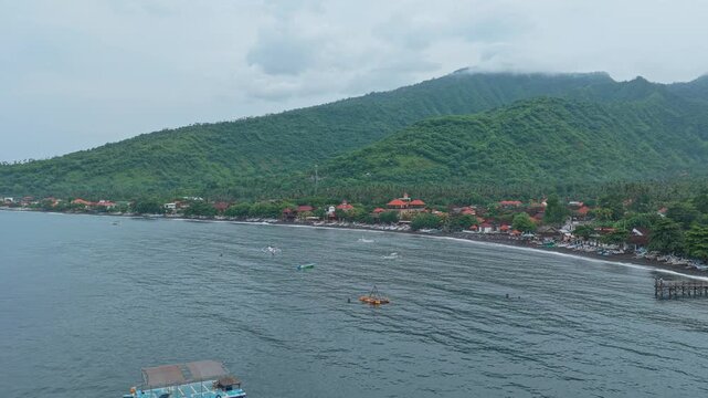 Aerial view of amed fishing village coastline in bali