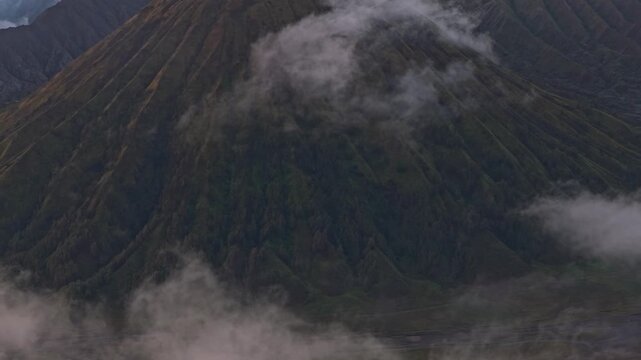 Revealing active semeru volcano behind mount bromo caldera