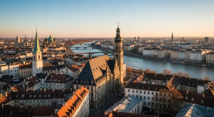 Obraz premium Aerial View of a Picturesque European Cityscape at Sunset River and Buildings.