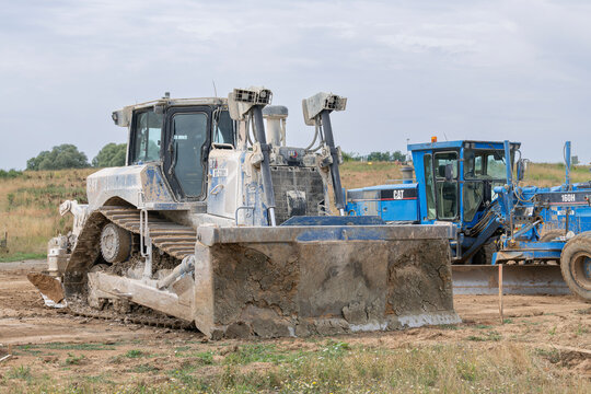 Hambach, France - July 20th 2025 : View on a blue bulldozer CAT D7 for earthworks on a construction site.