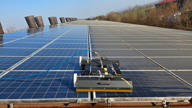 dirty and cleaned solar panels by cleaning robot