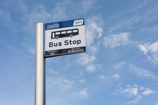 AYR, UK - JANUARY 29, 2026: Public bus stop sign with blue sky in Ayr
