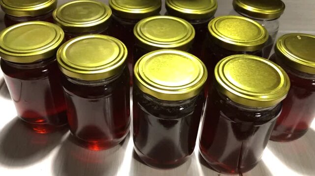 Glass jars filled with honey