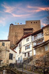 Fototapeta premium Castle overlooking the town of Alcalá de la Selva, Teruel, Aragon, Spain