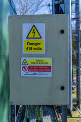 High Voltage and Radio Frequency Warning on Electrical Cabinet