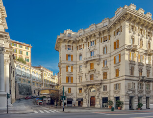 Fototapeta premium Genoa, Liguria, Italy - Palazzo Zuccarino-Cerutti in neoclassical Art Nouveau style in Via XX Settembre, with the Faculty of Education building in the background in via Foscolo