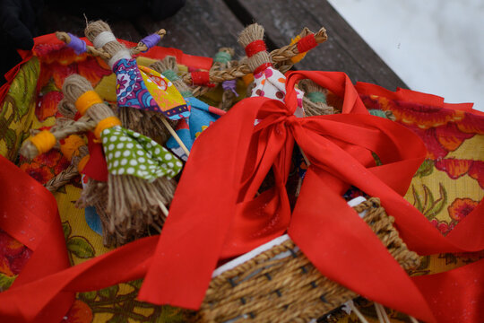Maslenitsa dolls. 
Homemade Maslenitsa dolls. Unlike the large effigy that is burned, these small amulets made of fabric and bast were made for the home.
They are considered a symbol of prosperity and
