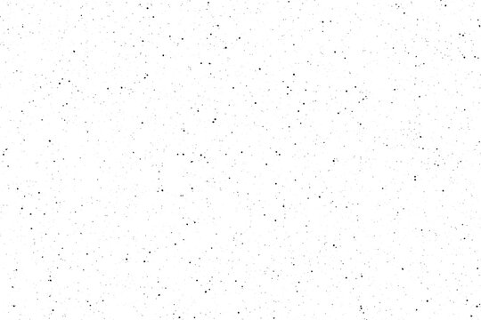 A vast expanse of tiny black points randomly distributed across a brilliant white background