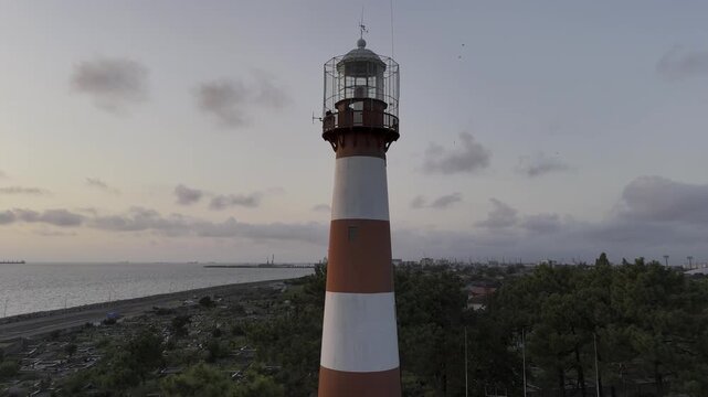 lighthouse on the shore of the sea