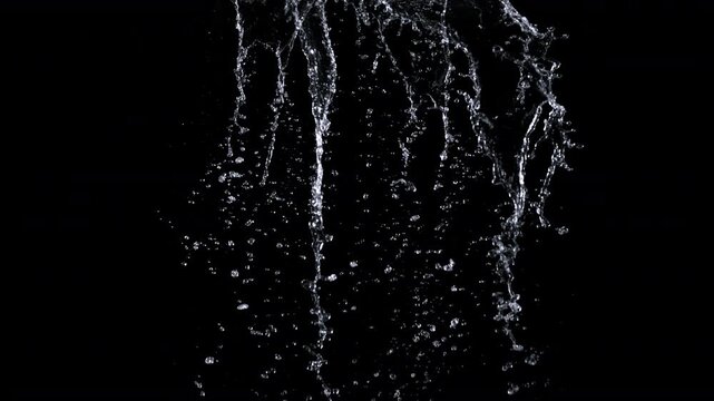 Super Slow Motion Shot of Falling Water Isolated on Black at 1000fps.