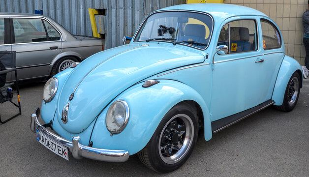 Classic light blue Volkswagen Beetle is more than just a vehicle it is cultural phenomenon that became symbol of freedom, individuality and the counterculture of the 1960s