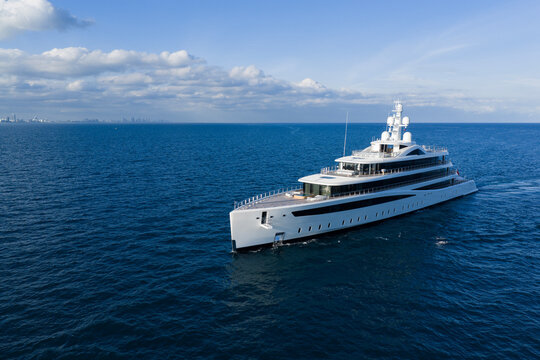 Motorboat sailing at sea. Luxury private yacht in sea. Motor yacht luxury vessel. Boat motor aerial. Vacation on summer. Aerial view motorboat. Luxury lifestyle. Vacation on summer. Yacht at sea